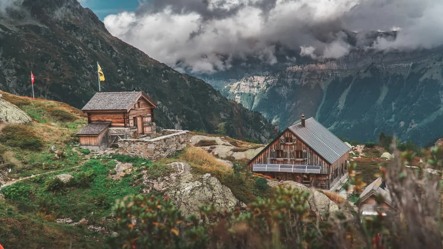 Stone and timber cabins in the mountains