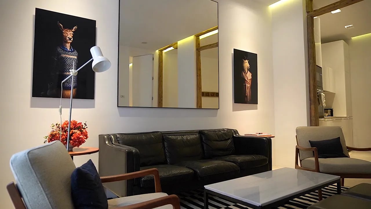 Living room of one of the Apartamentos Botones, in Madrid