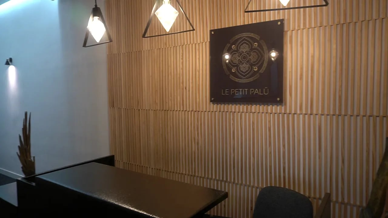 Reception at Le Petit Palú with its logo